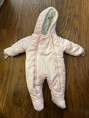 Baby pink snowsuit for cold weather